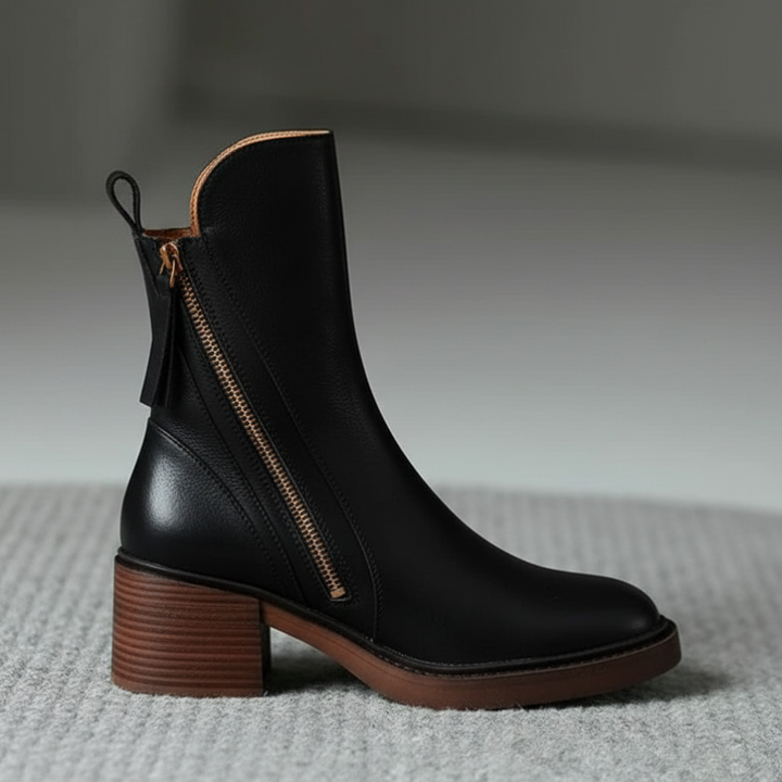 Beatrice | Black leather boot with a comfortable heel, elegant and timeless.